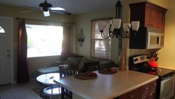 Classic Cottage, 1 Bedroom, Non Smoking | Living area | Flat-screen TV