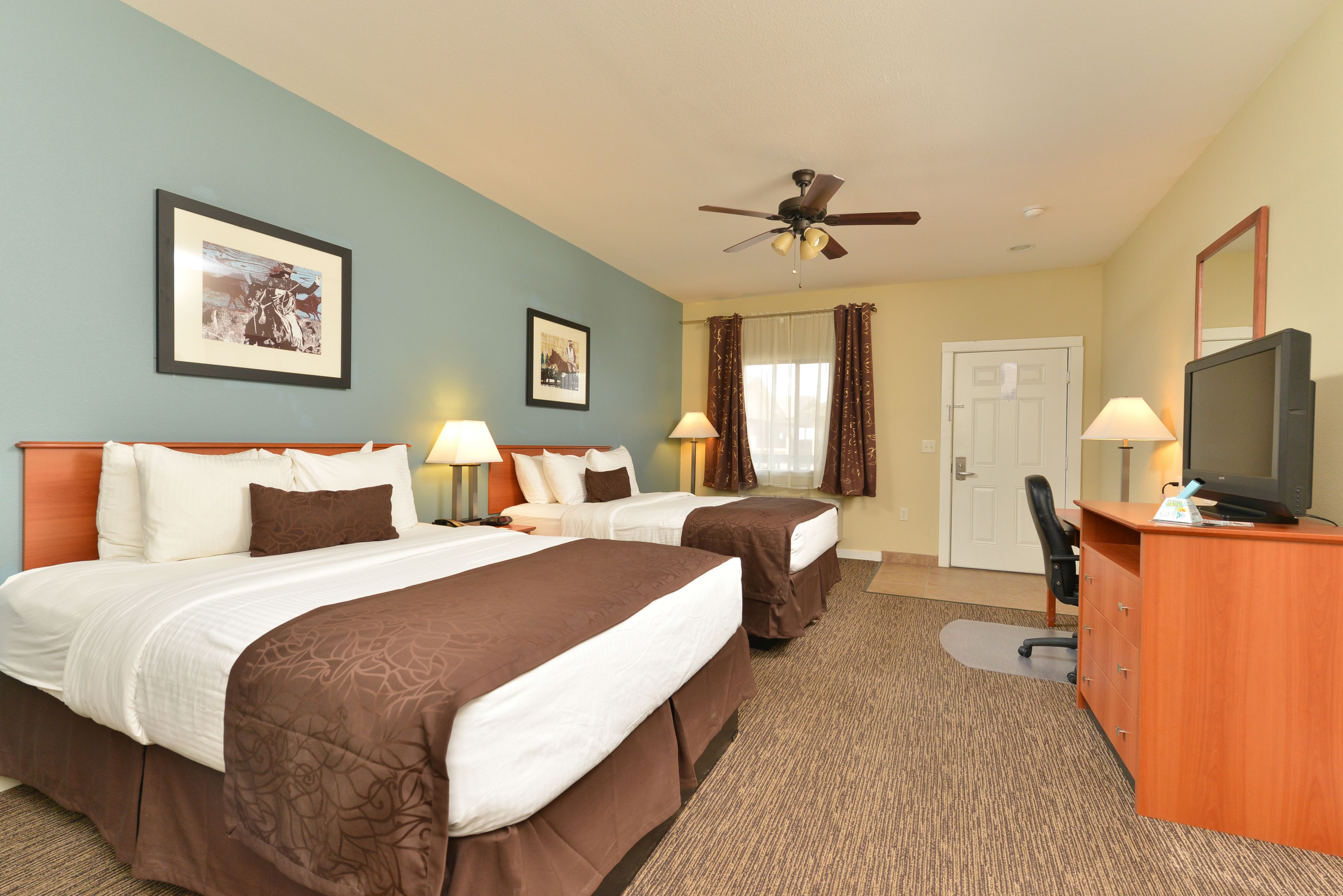 standard double room, 2 queen beds | desk, iron/ironing board, free cots/infant beds, rollaway beds