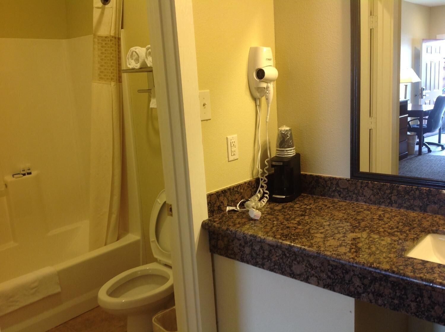 combined shower/bathtub, free toiletries, hair dryer, towels