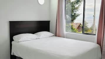 Family Suite, 2 Bedrooms, Kitchenette, Ocean View | Free minibar, individually decorated, individually furnished, desk