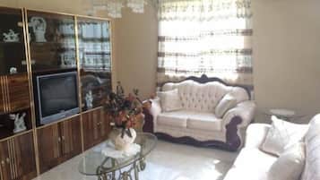 Basic House, 3 Bedrooms | Living area | TV, DVD player