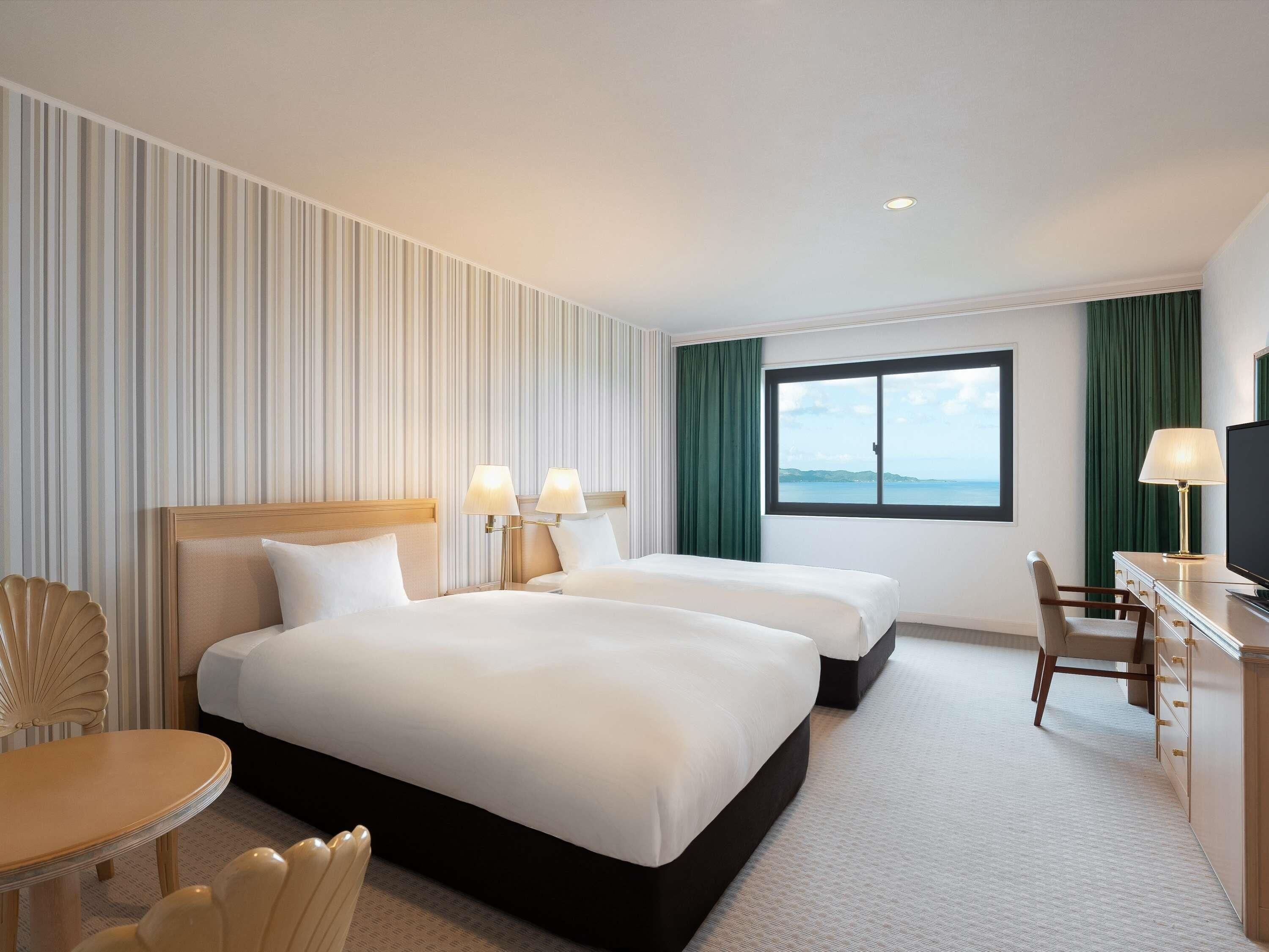 Deluxe Suite, Multiple Beds, Ocean View | 2 bedrooms, in-room safe, free WiFi, bed sheets