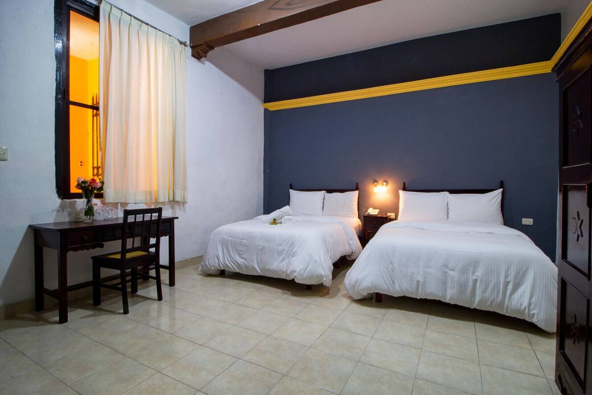 Premium bedding, desk, iron/ironing board (on request), WiFi (free)