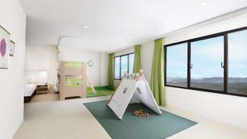 A child's room with bunk beds, a play tent, and a view of the outdoors.