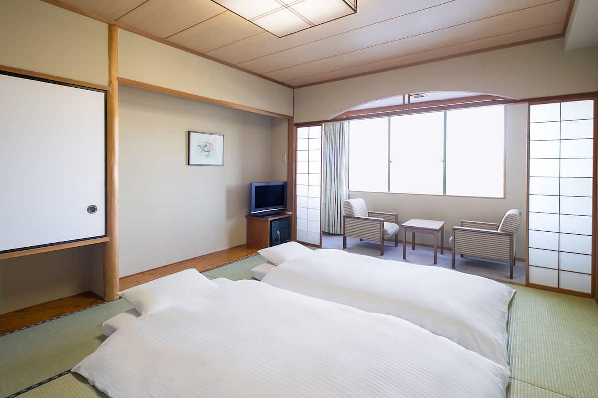 classic room, japanese style, 4 futon beds | premium bedding, in-room safe, desk, blackout curtains