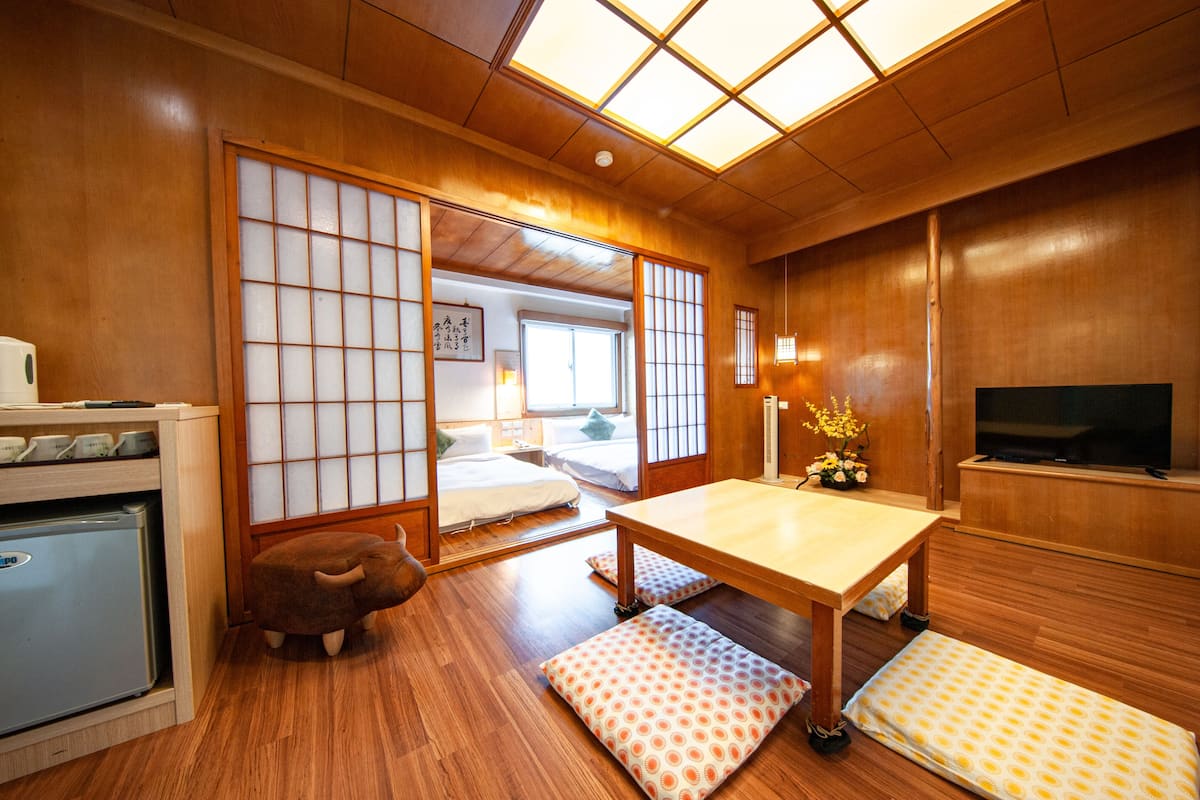 Suite Tradition | 1 chambre, rideaux occultants, Wi-Fi gratuit, draps fournis