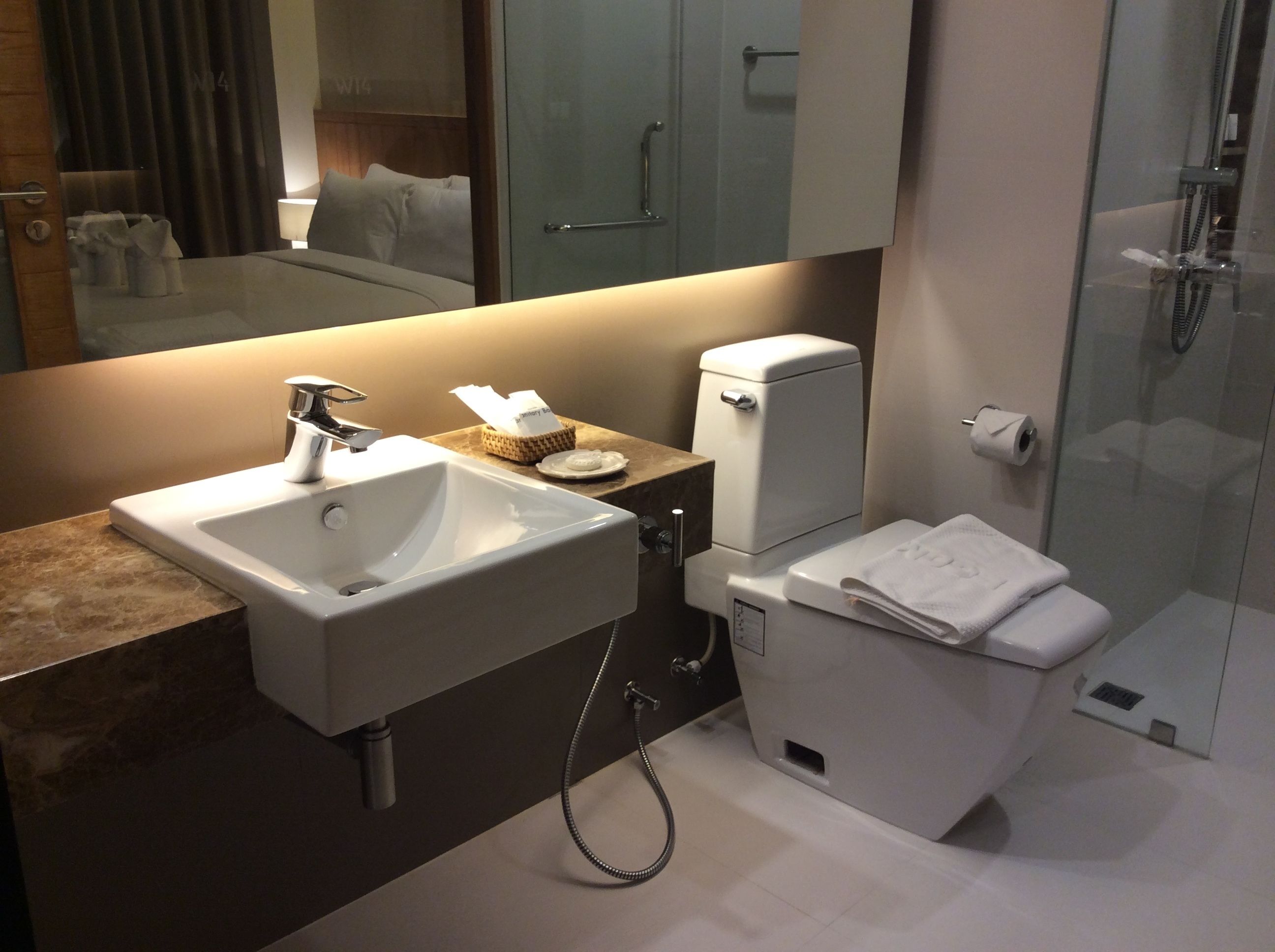 shower, free toiletries, bathrobes, slippers