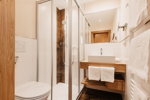 Economy Double Room, Balcony | Bathroom | Free toiletries, hair dryer, bathrobes, slippers
