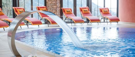 Indoor pool, open 7:00 AM to 8:00 PM, pool umbrellas, pool loungers