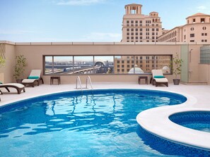 Outdoor pool, pool umbrellas, pool loungers