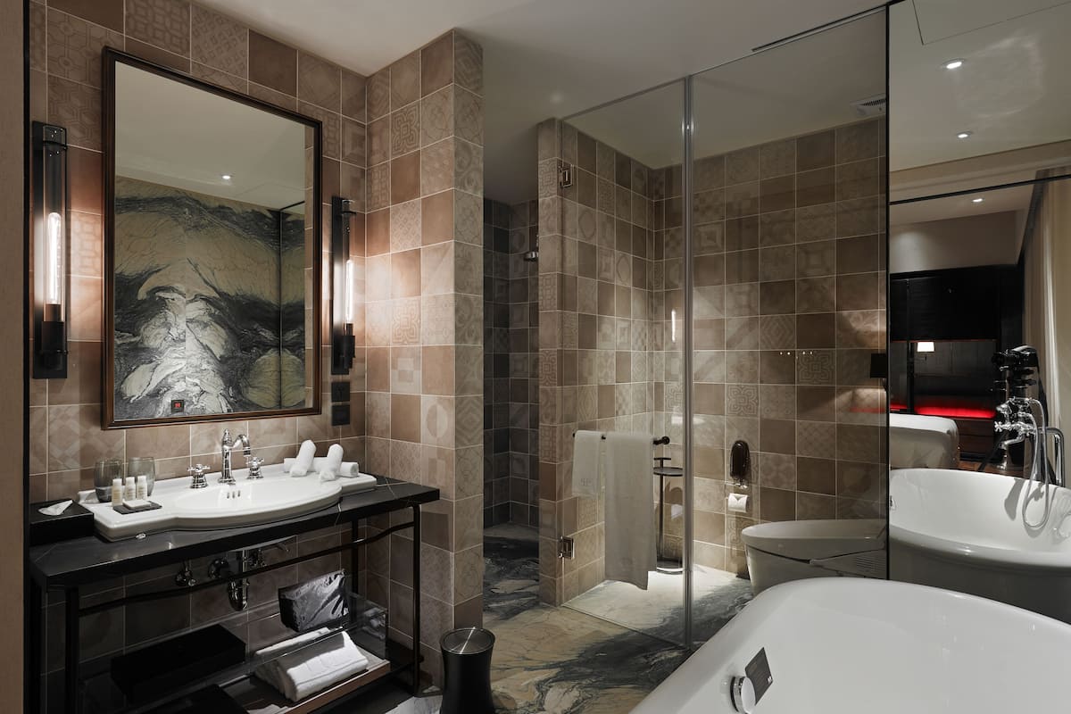 premium room | bathroom | separate bathtub and shower, deep-soaking bathtub