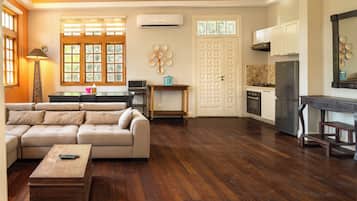 Deluxe Apartment, Balcony | Living area