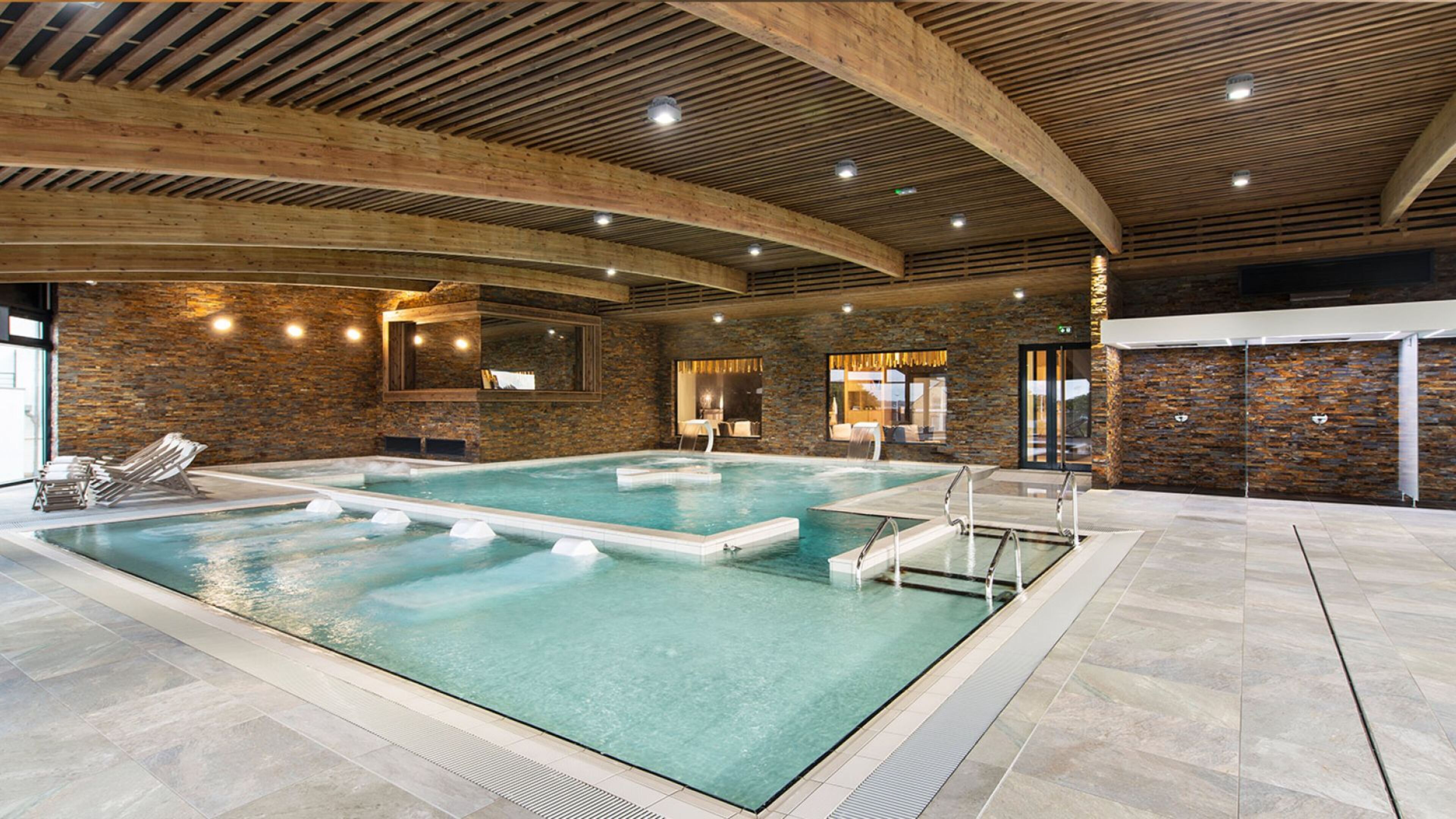 indoor pool, seasonal outdoor pool, pool loungers