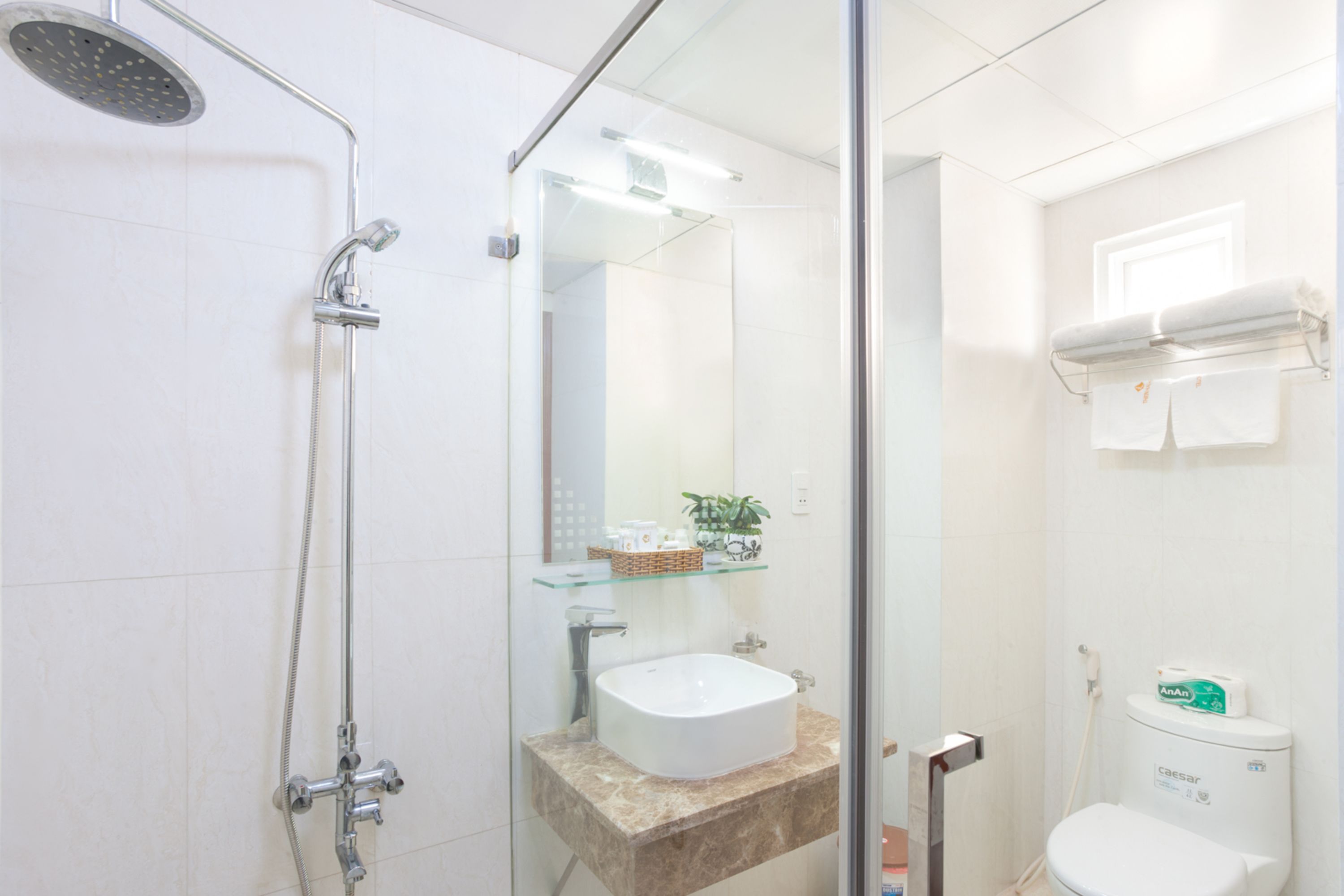superior double room | bathroom | shower, rainfall showerhead, free toiletries, hair dryer