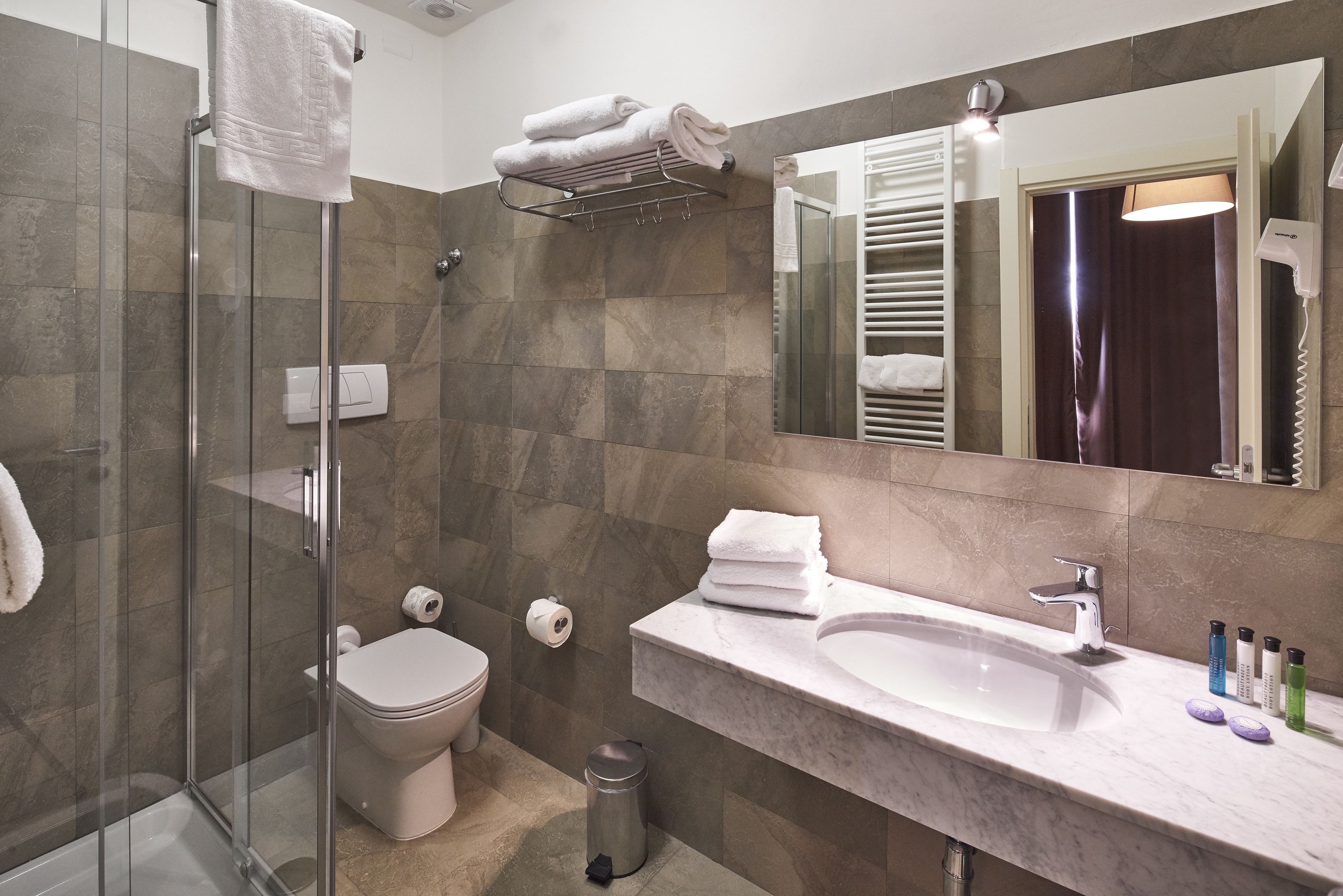 shower, free toiletries, hair dryer, slippers