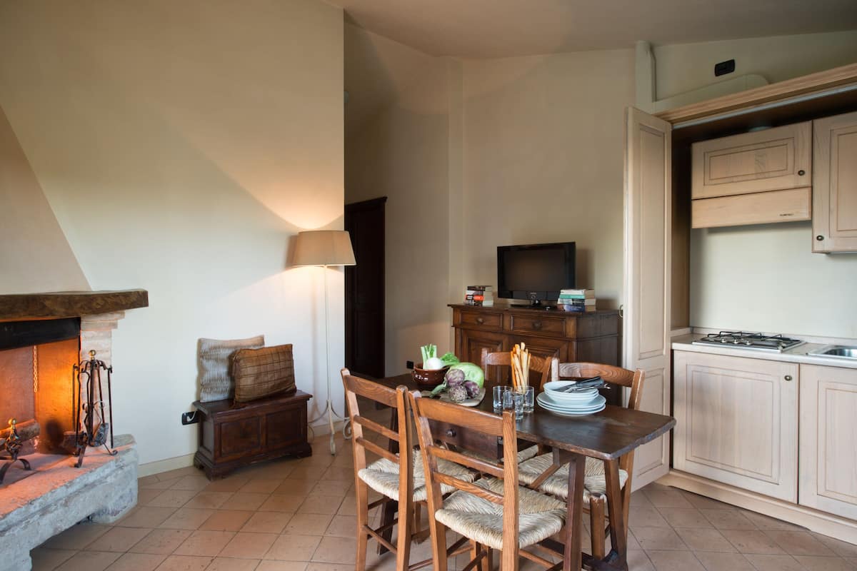 apartment, 2 bedrooms, 2 bathrooms (trilocale garden) | private kitchen | mini-fridge, stovetop, electric kettle, high chair