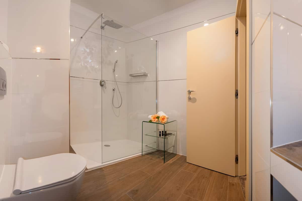 standard double or twin room | bathroom | shower, designer toiletries, hair dryer, bathrobes