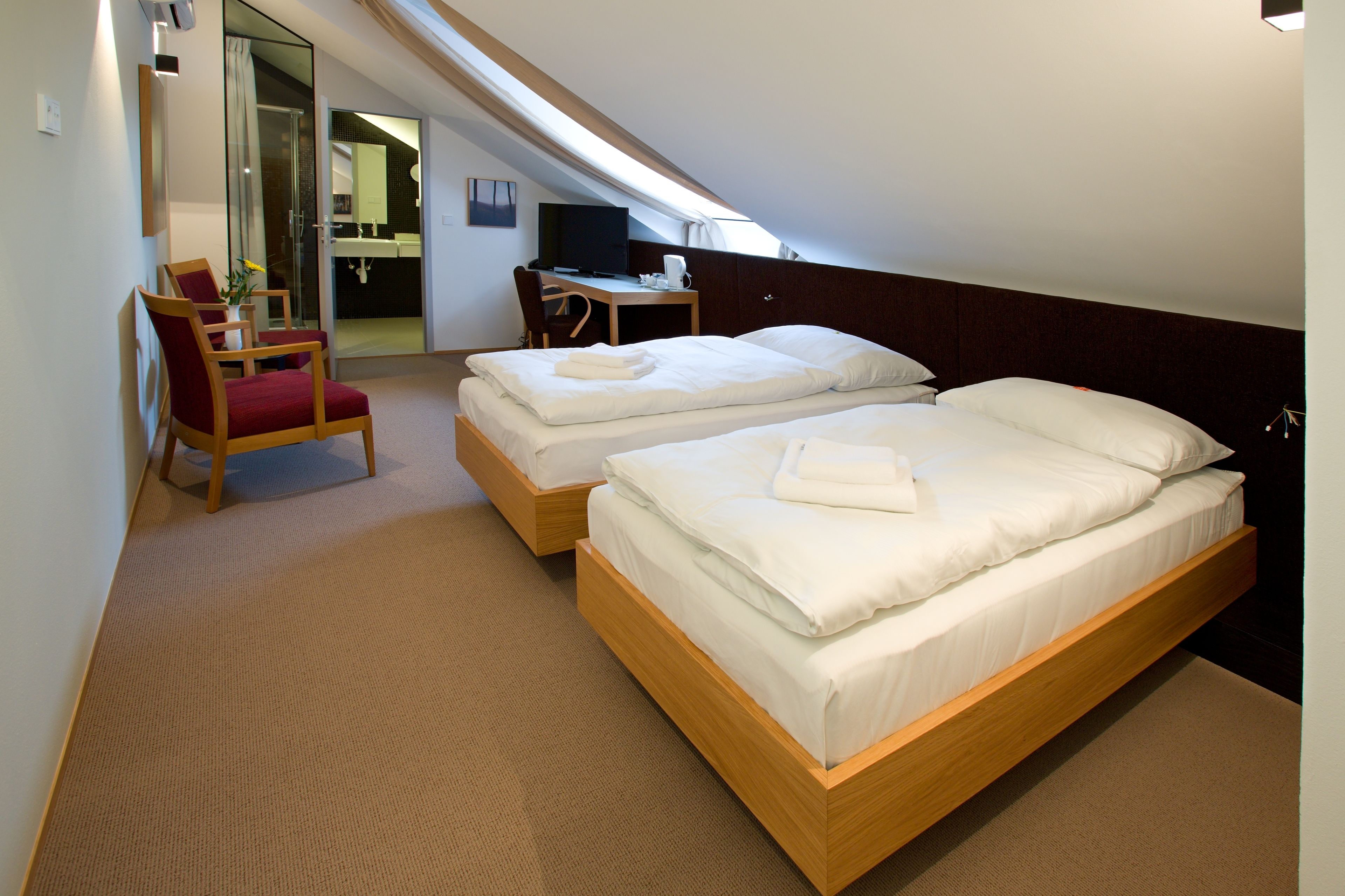 premium double or twin room | minibar, in-room safe, desk, blackout curtains