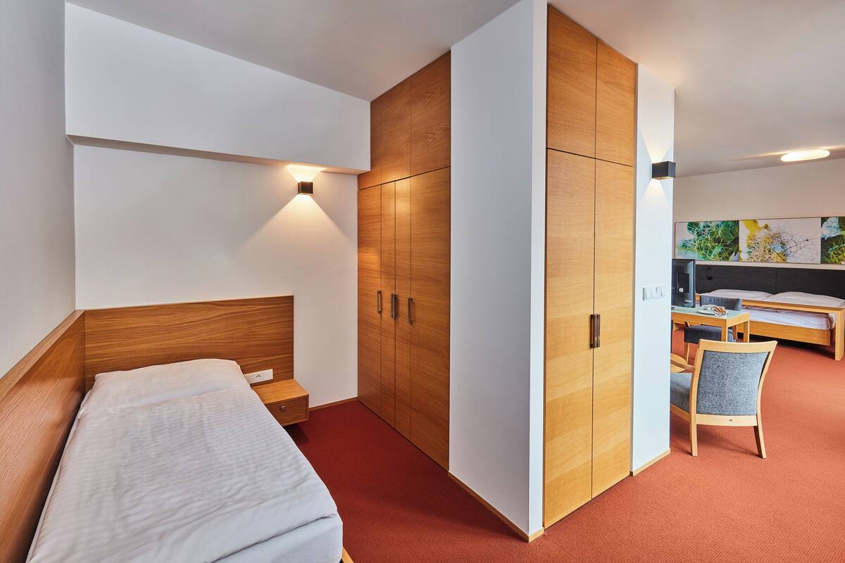 royal room | minibar, in-room safe, desk, blackout curtains