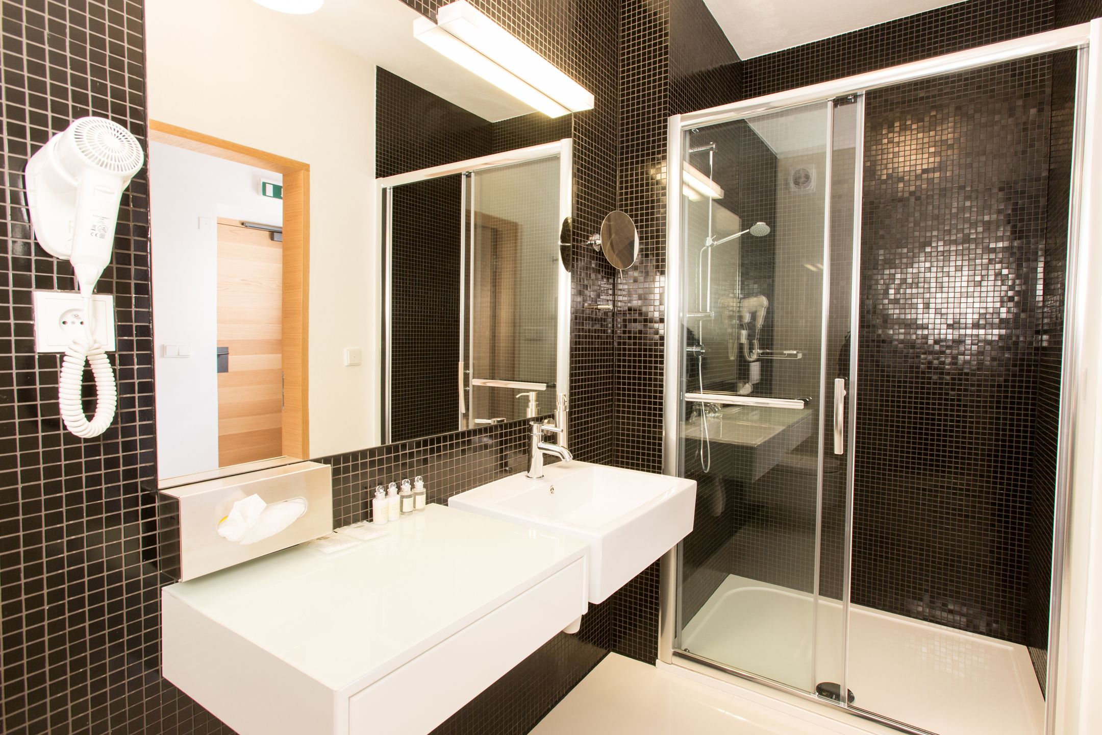 shower, rainfall showerhead, hair dryer, towels