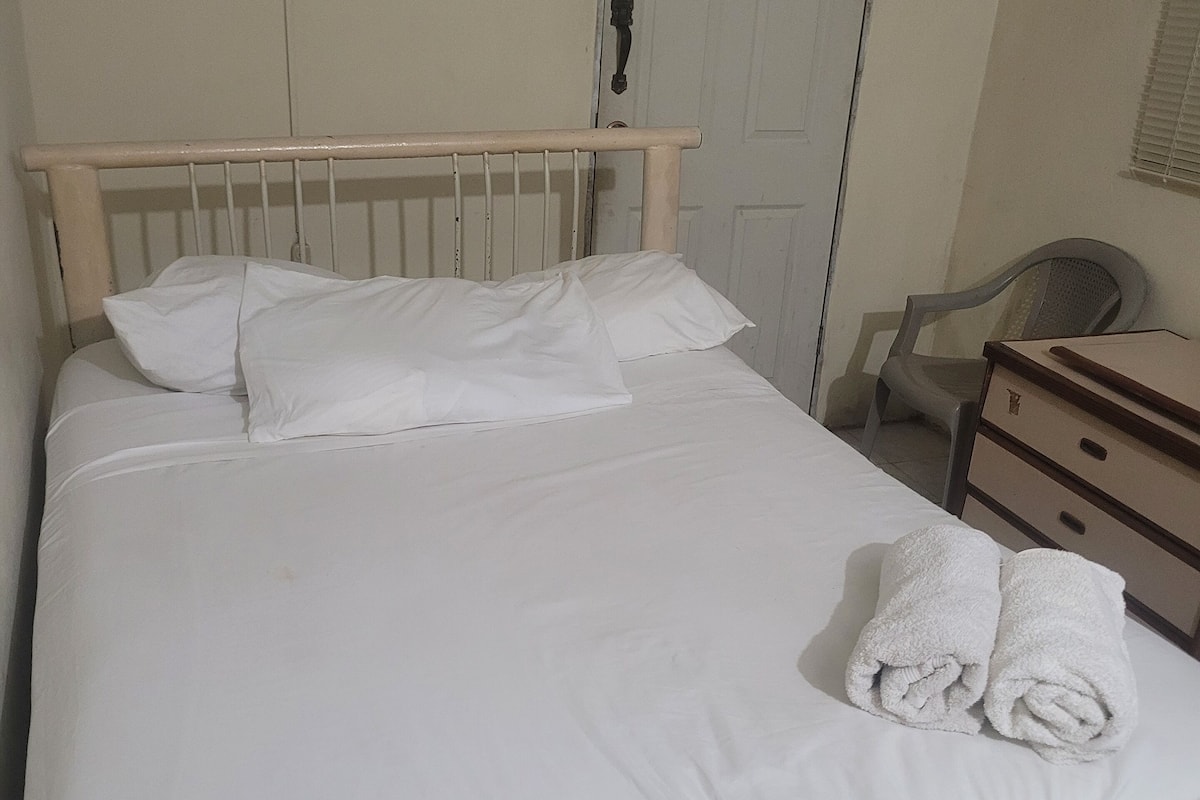 Economy Studio | Individually furnished, blackout drapes, free WiFi, bed sheets
