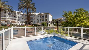 Outdoor pool, pool umbrellas, pool loungers
