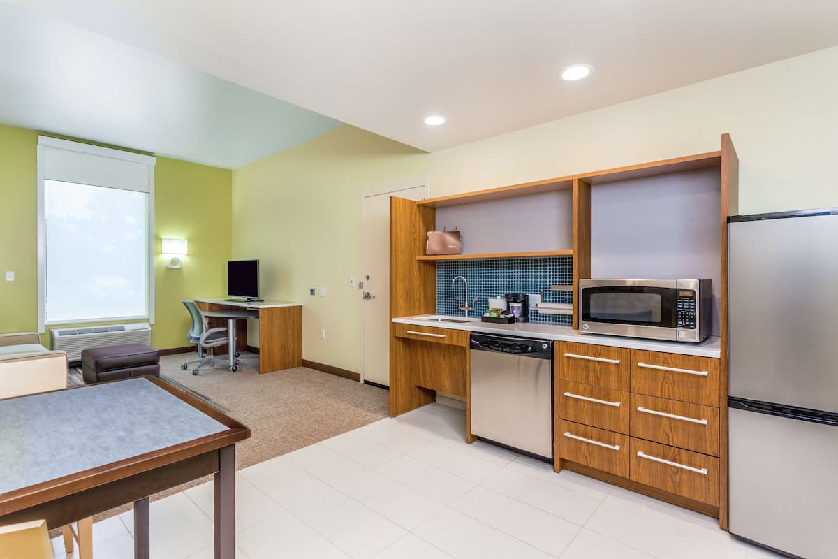 full-sized fridge, microwave, dishwasher, coffee/tea maker