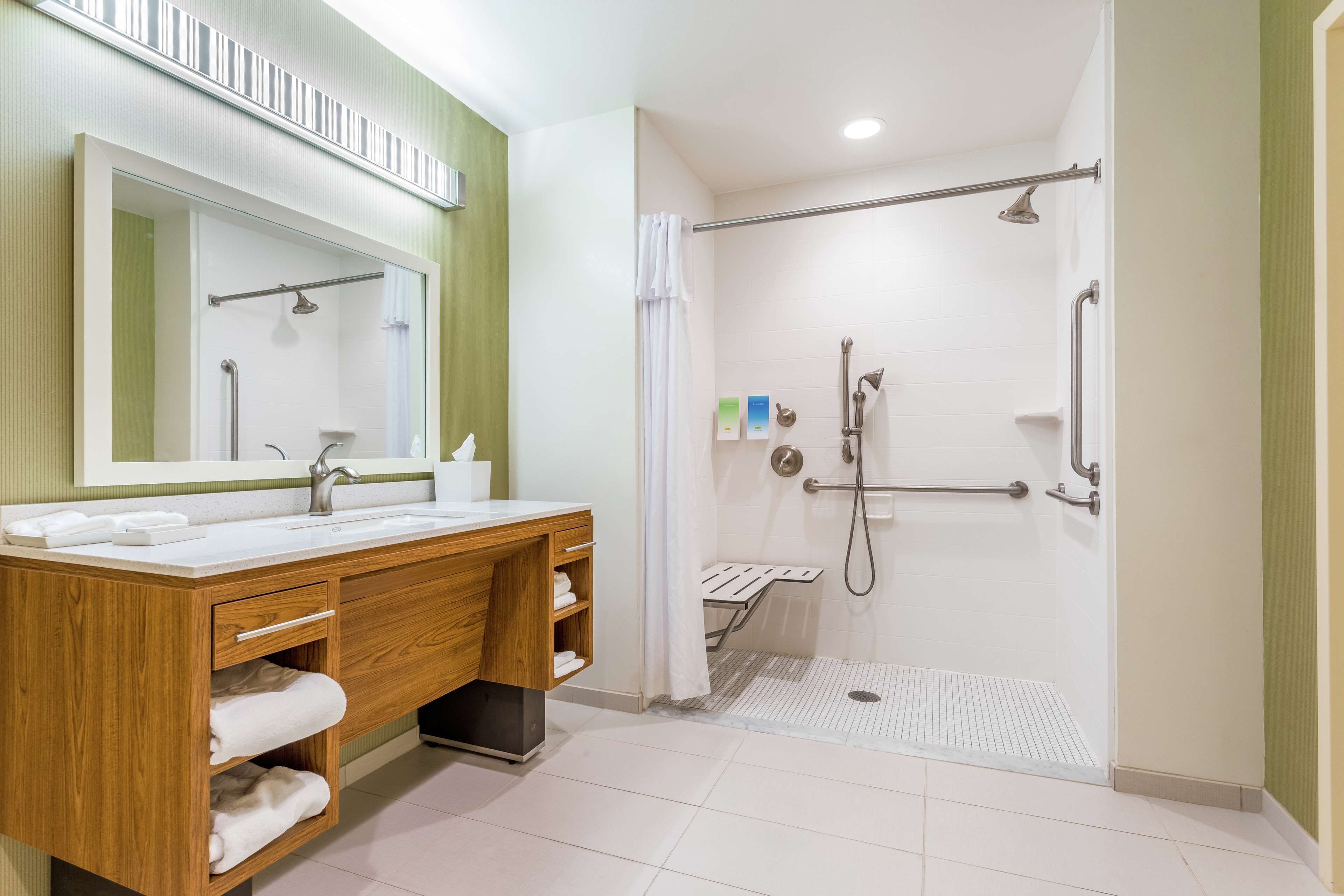 queen one bedroom suite accessible roll-in shower | bathroom | hair dryer, towels