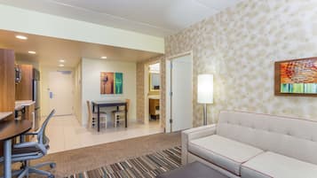 Queen One Bedroom Suite | Desk, laptop workspace, iron/ironing board, travel crib
