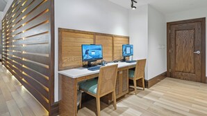 A modern office space with two desks, computers, and chairs. - Margaritaville Vacation Club - St. Thomas (St. Thomas)