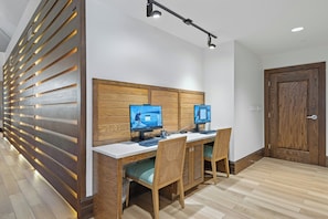 A modern office space with two desks, computers, and chairs. - Margaritaville Vacation Club - St. Thomas (St. Thomas)