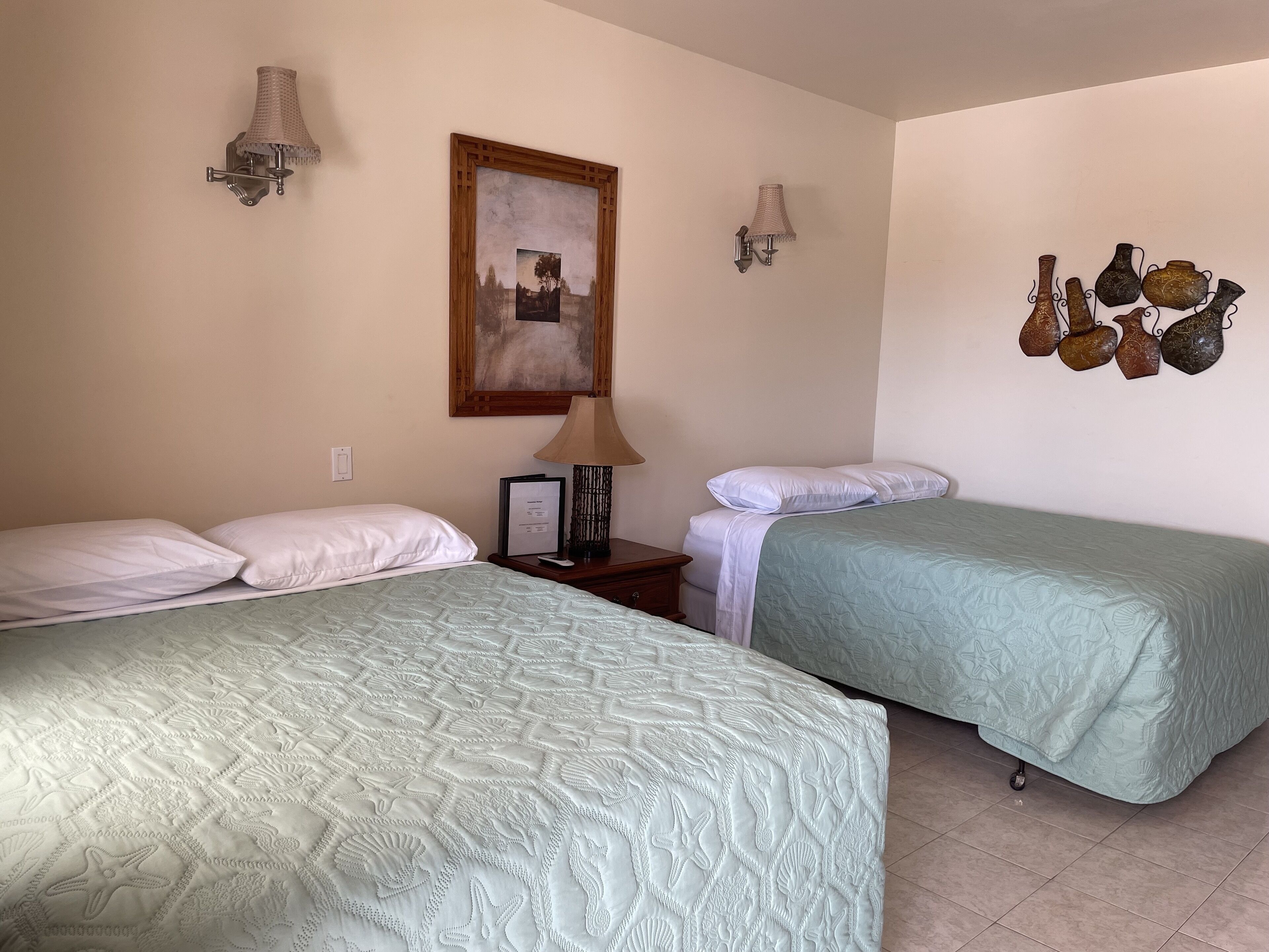 basic single room, 2 queen beds | 1 bedroom, individually decorated, individually furnished