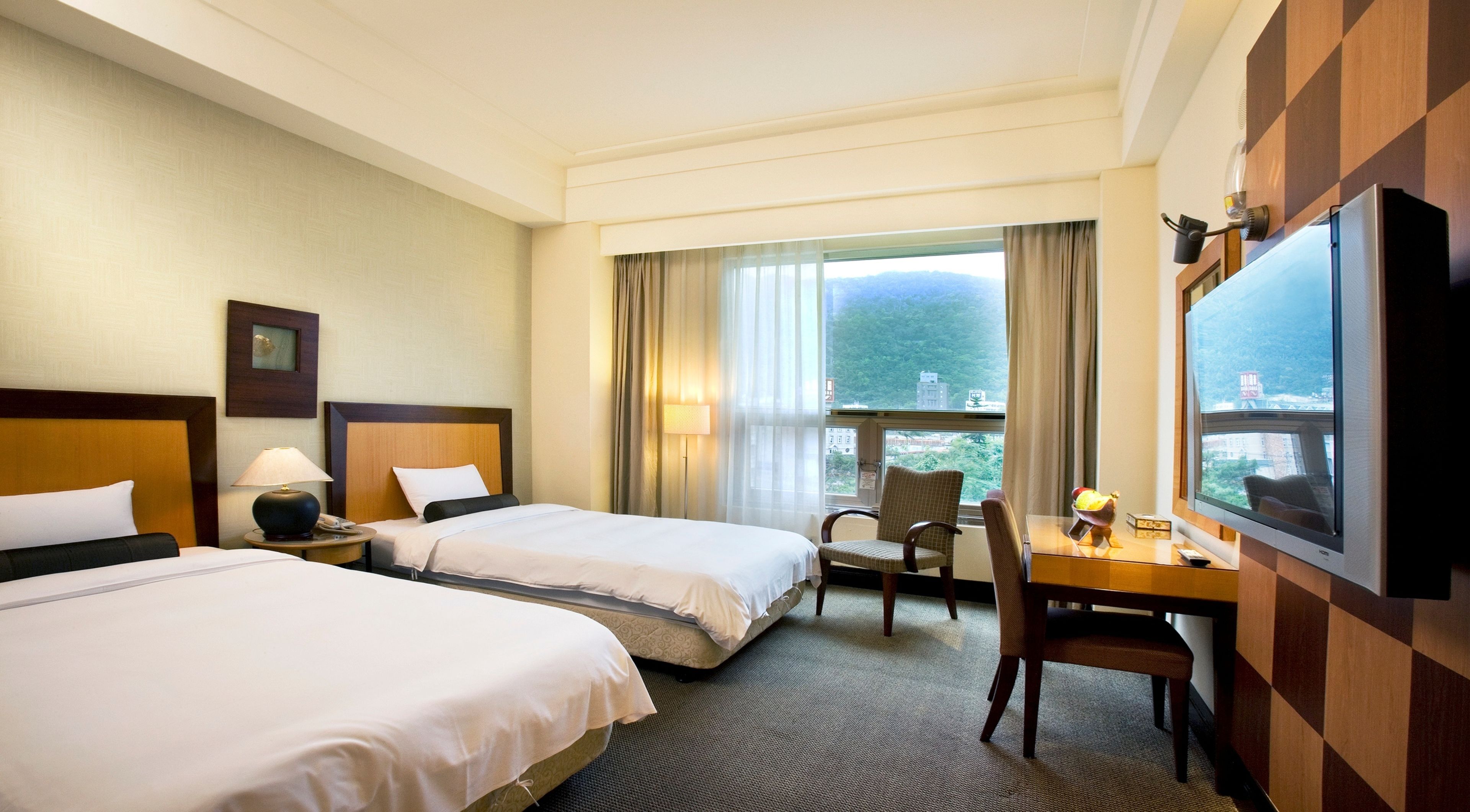 deluxe twin room | premium bedding, down duvets, minibar, blackout curtains