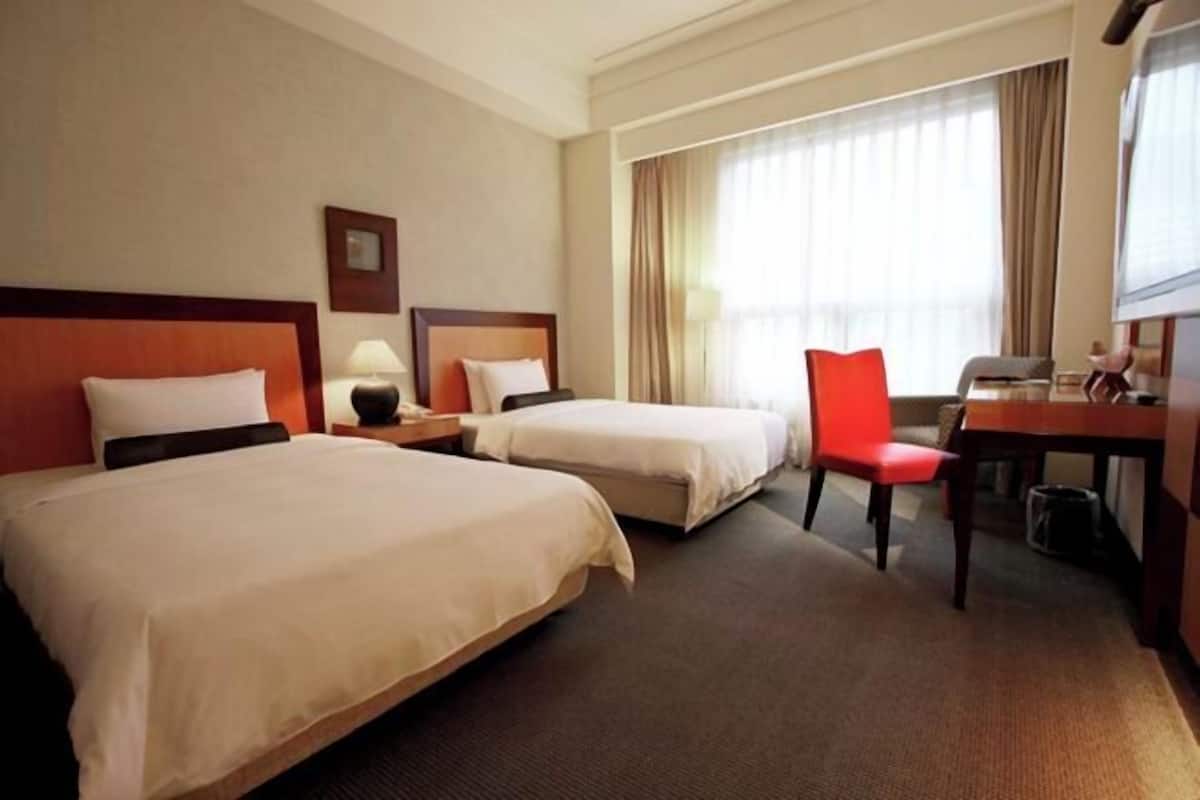 Premium-sengetøj, dundyner, minibar, mørklægningsgardiner