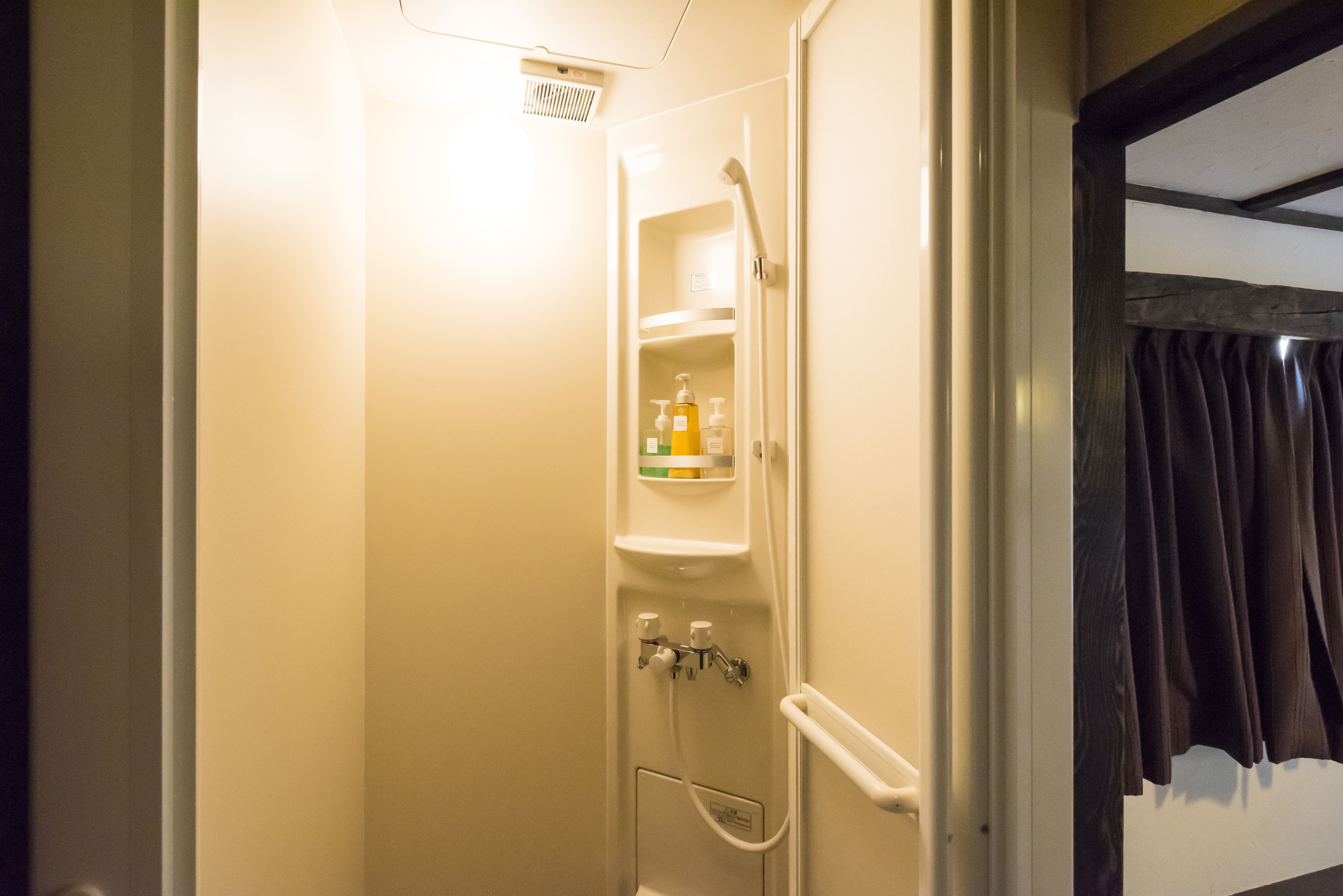 deluxe 4 bed with private bathroom | bathroom | free toiletries, hair dryer, slippers, towels