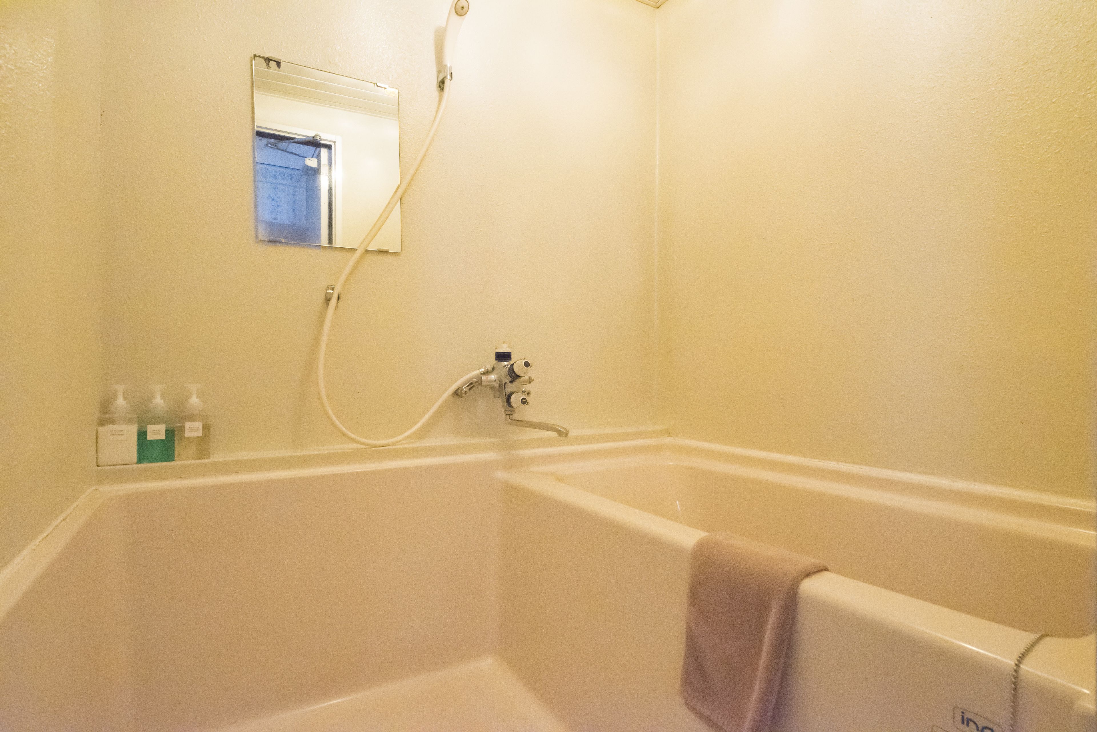 compact suite double with private bathroom | bathroom | free toiletries, hair dryer, slippers, towels