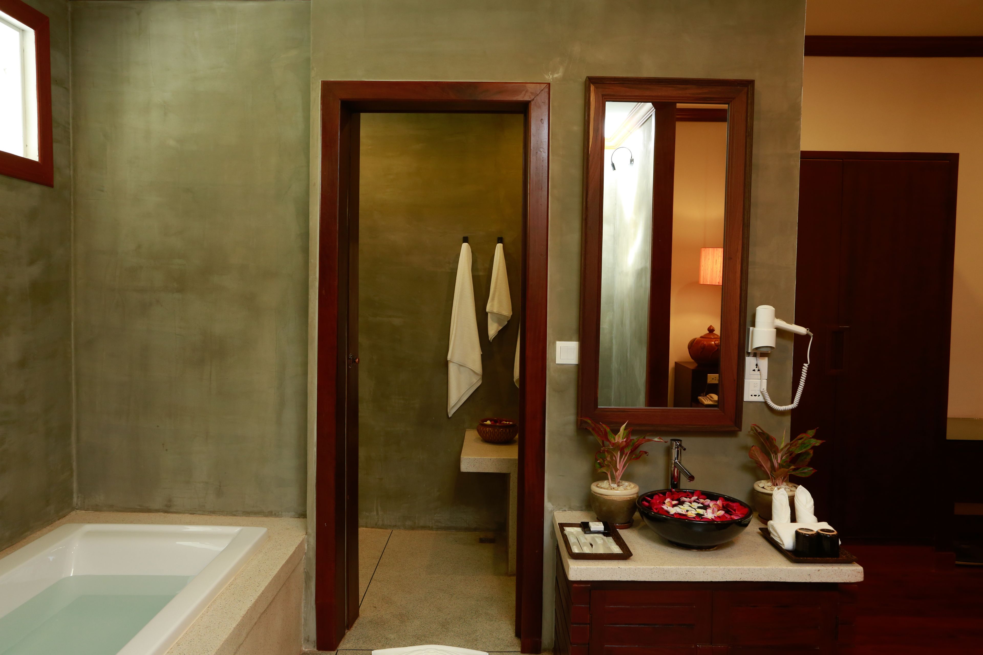 landmark king, balcony, garden view | bathroom | designer toiletries, hair dryer, bathrobes, slippers