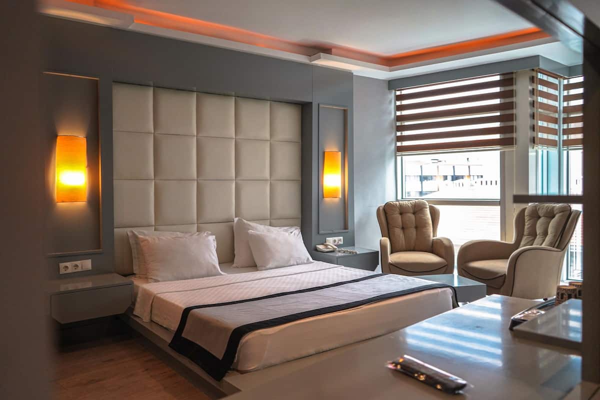 Suíte júnior, vista para a cidade | 1 quarto, roupas de cama premium, frigobar (abastecido com itens grátis)