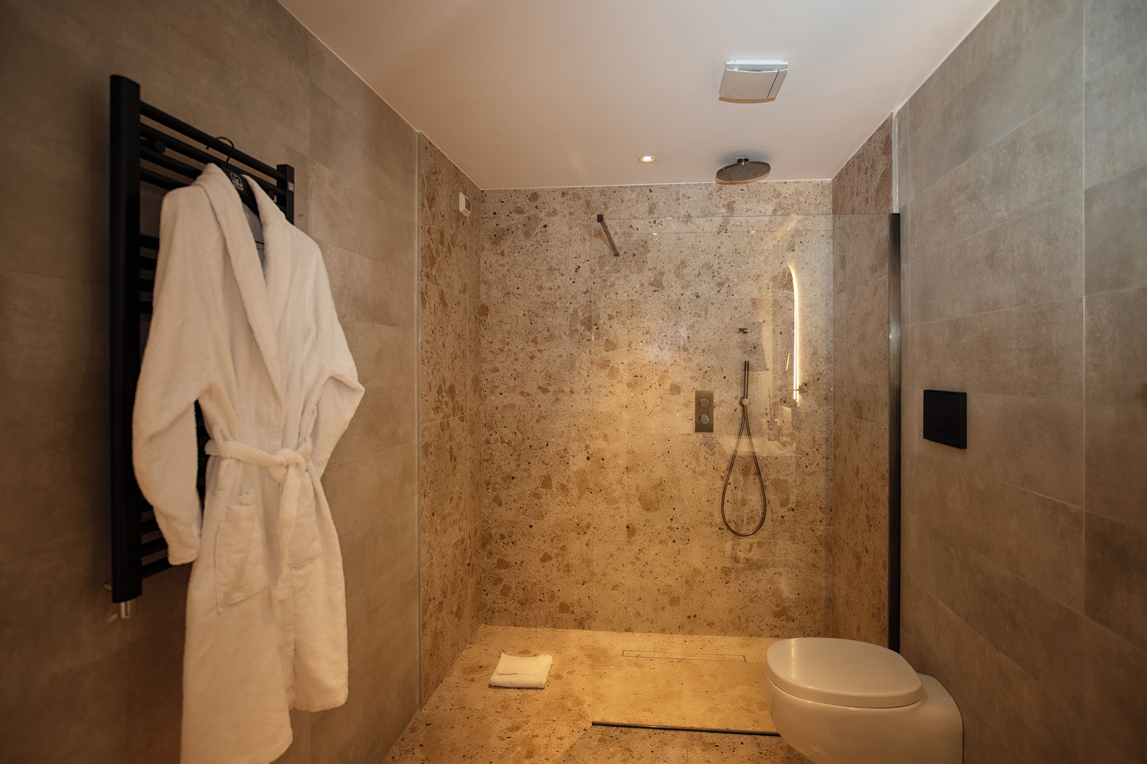 shower, rainfall showerhead, designer toiletries, hair dryer