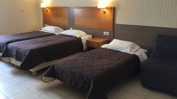 Family Triple Room | Desk, iron/ironing board, free WiFi, bed sheets