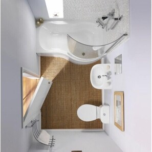 Suite, 1 cama de matrimonio, terraza, vistas a la ciudad | Baño | Ducha, artículos de higiene personal gratuitos y secador de pelo