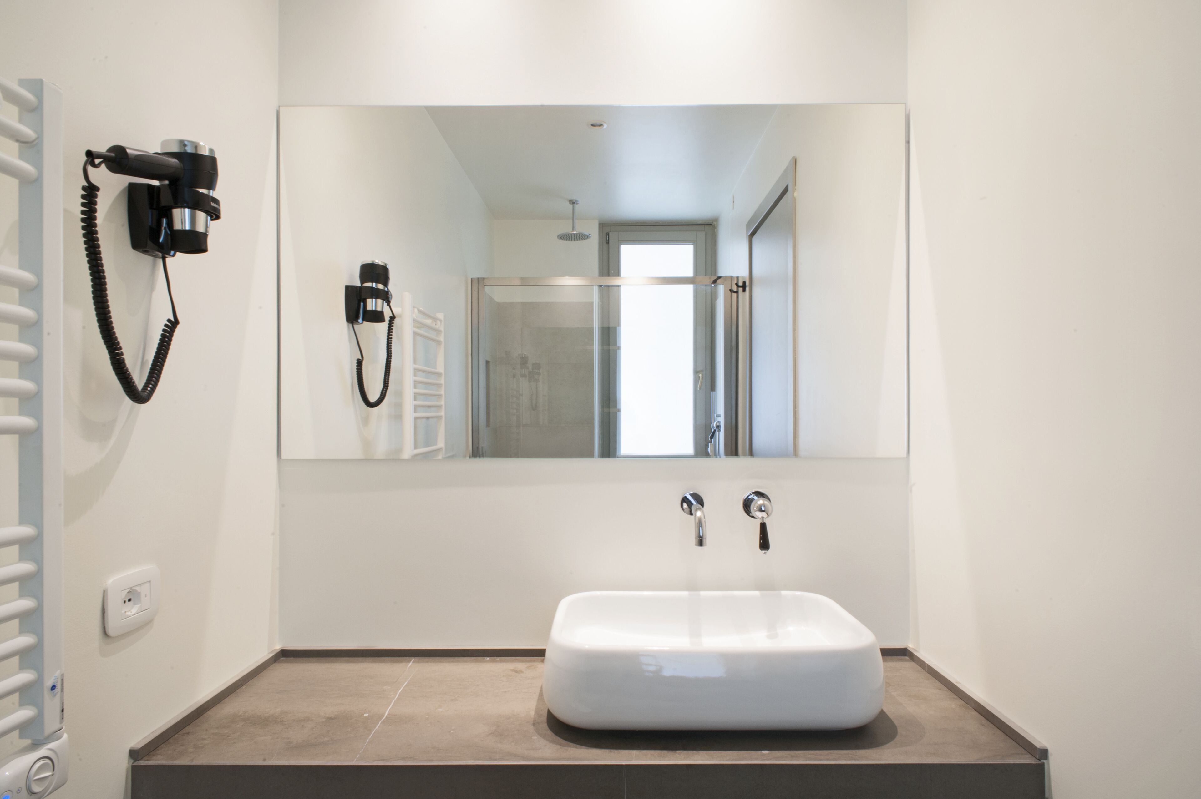 free toiletries, hair dryer, slippers, bidet