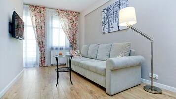 Apartemen (Elegante) | Ruang keluarga | Televisi layar datar 40-inci dengan saluran TV digital dan TV