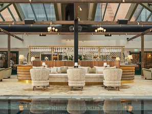 Indoor pool, 3 outdoor pools, open 8:00 AM to 11:00 PM, pool umbrellas