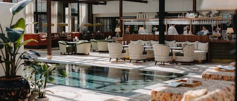 Indoor pool, 3 outdoor pools, open 8:00 AM to 11:00 PM, pool umbrellas