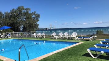 Seasonal outdoor pool, open 9:00 AM to 10 PM, sun loungers