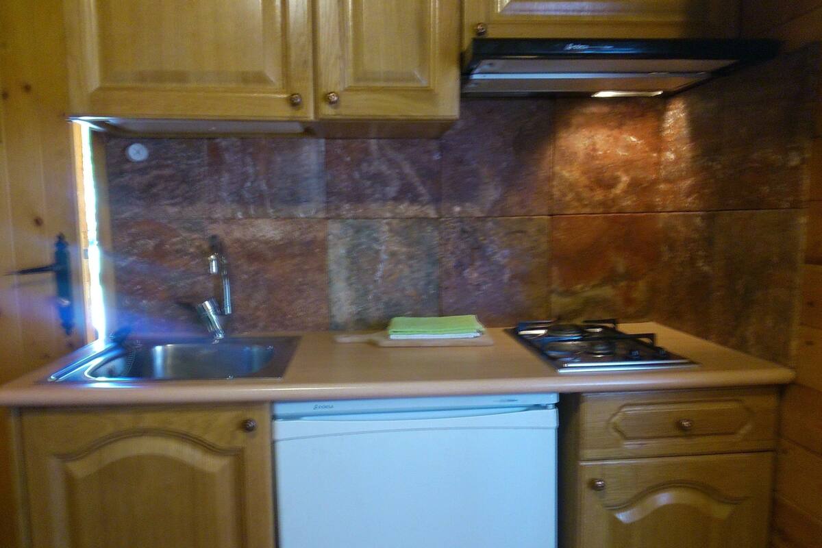 Bungalow, 2 Bedrooms (4 people) | Private kitchenette | Full-sized fridge, stovetop, coffee/tea maker, cookware/dishes/utensils