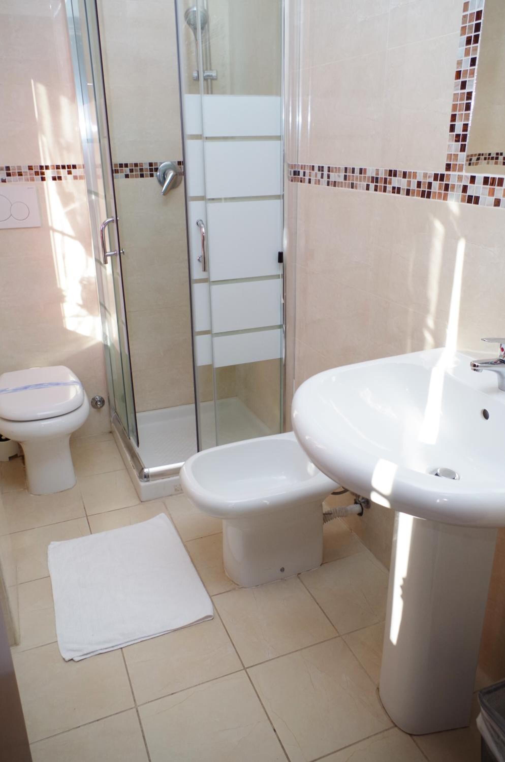 Shower, free toiletries, hair dryer, bathrobes