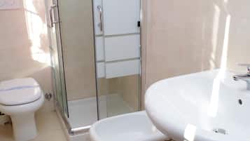 Shower, free toiletries, hair dryer, bathrobes