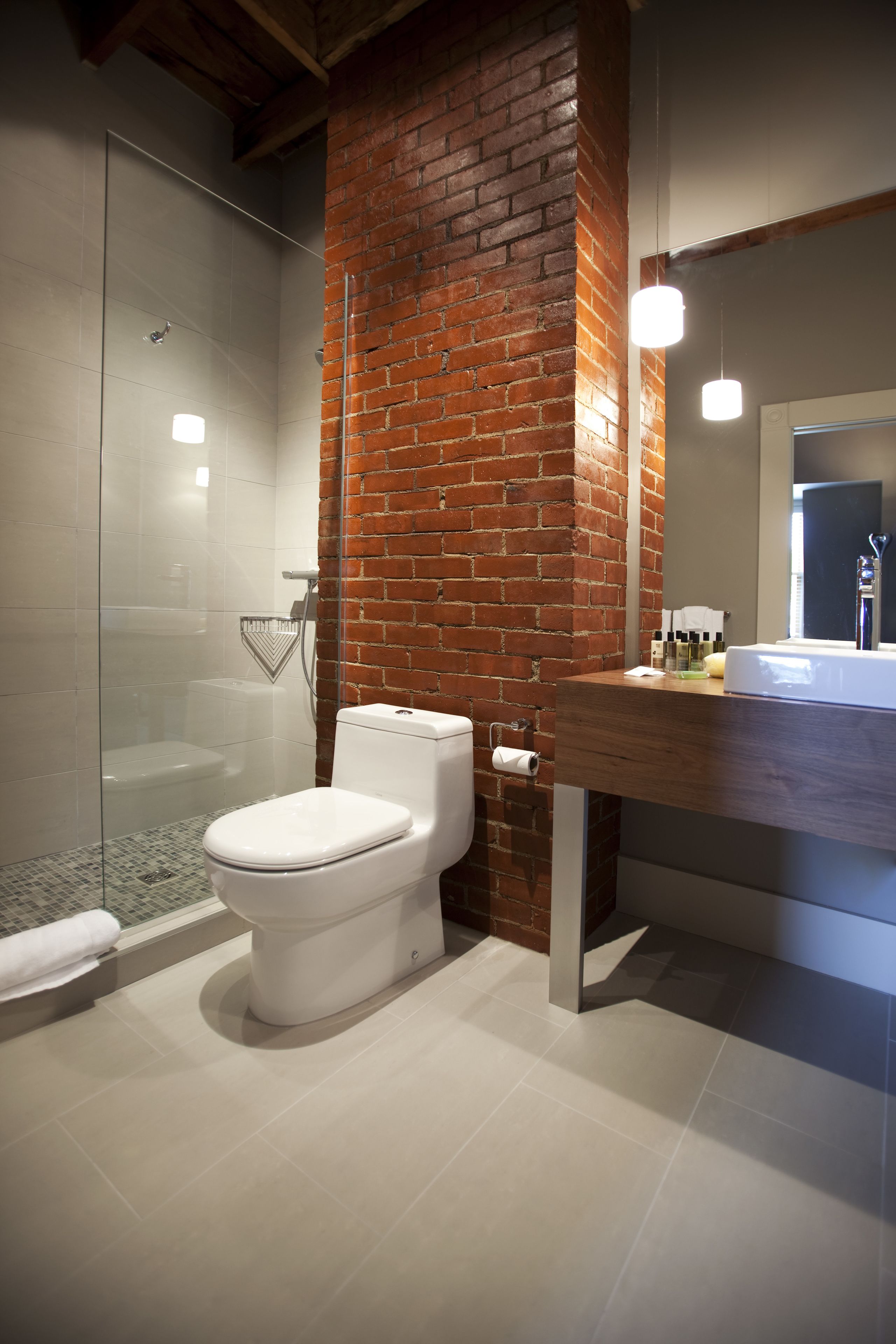 deluxe room, 1 queen bed, private bathroom | bathroom | designer toiletries, hair dryer, bathrobes, towels